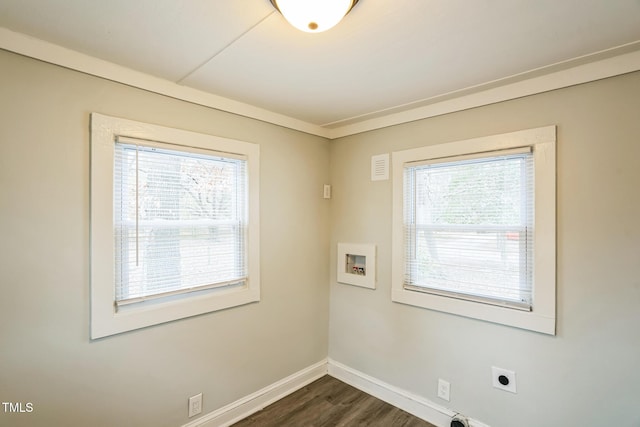 washroom with washer hookup, dark hardwood / wood-style floors, and electric dryer hookup