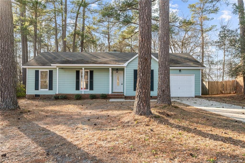 ranch-style home with a garage