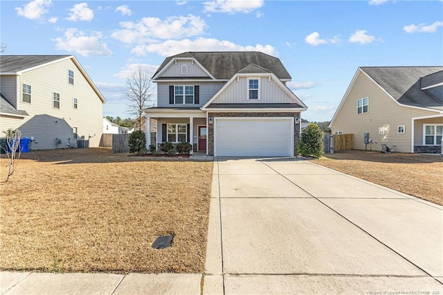 view of front of house featuring a garage and a porch