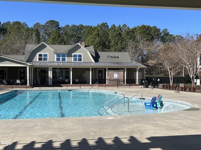 view of pool featuring a patio