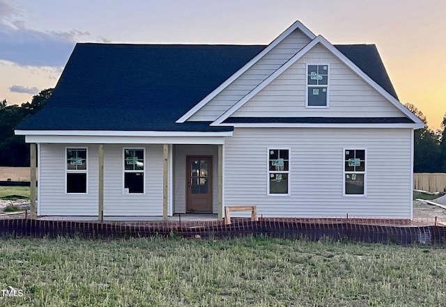 3963 Baileys Xrds Rd, Benson, NC 27504 - view of front facade with a front lawn and covered porch