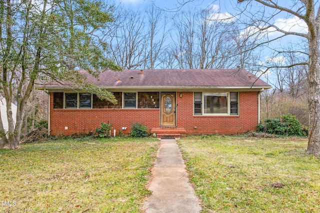 ranch-style house with a front yard