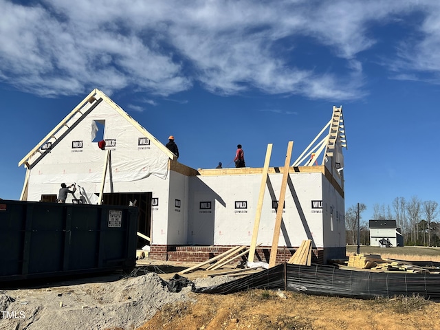 exterior space featuring fence and stucco siding