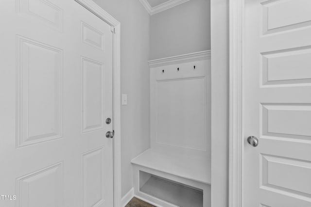 mudroom featuring crown molding