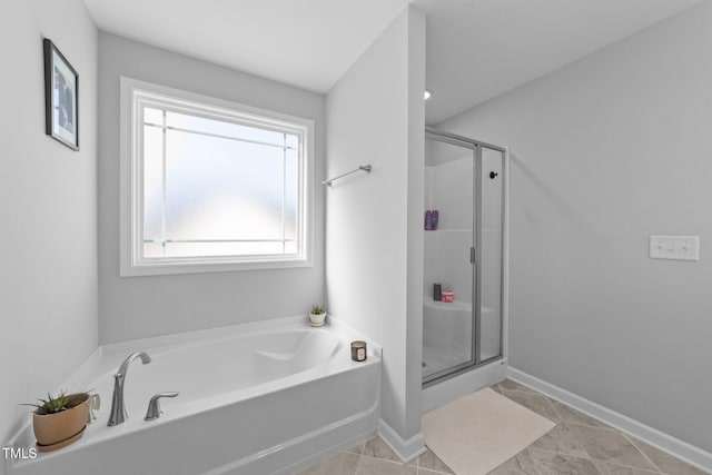 bathroom featuring plus walk in shower