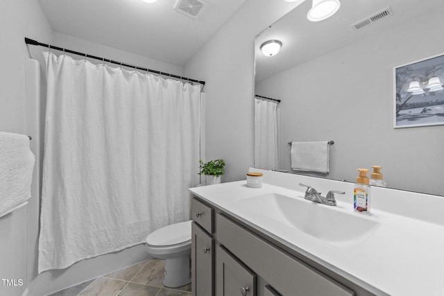 full bathroom with vanity, shower / bath combo, and toilet