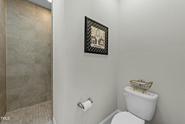 65 Balsam Ln, Clayton, NC 27527 - bathroom featuring toilet and tiled shower