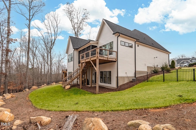 227 Beech Slope Ct, Chapel Hill, NC 27517 - rear view of property featuring a wooden deck, a yard, and a sunroom
