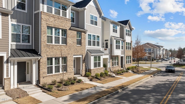 view of building exterior with a residential view