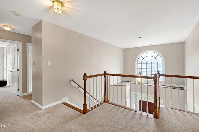 corridor featuring carpet floors