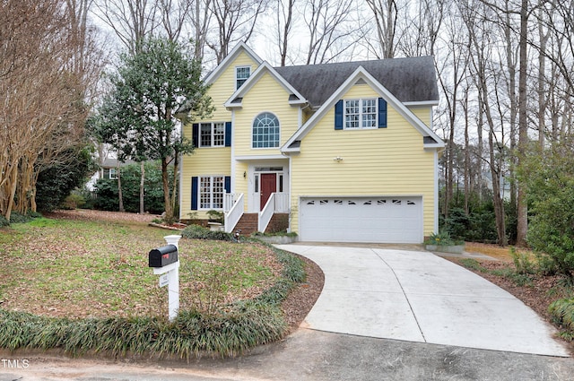 view of front of property with a garage