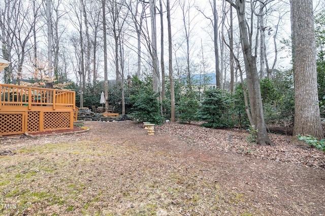 view of yard with a deck