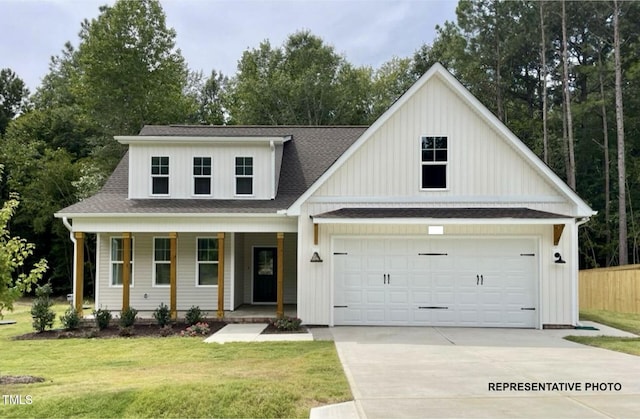 modern inspired farmhouse featuring fence, a porch, concrete driveway, a front yard, and roof with shingles