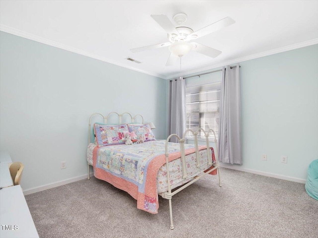 bedroom with ornamental molding, carpet, and ceiling fan