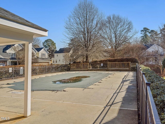 view of swimming pool with a patio