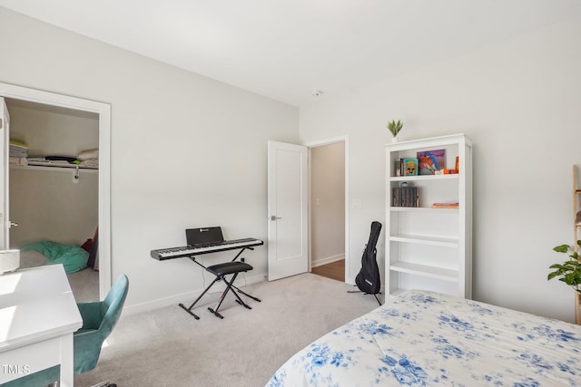 bedroom featuring light colored carpet