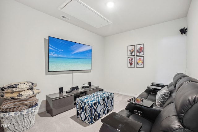 cinema room with light colored carpet