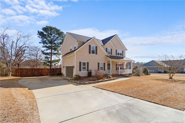 front facade featuring a garage and covered porch