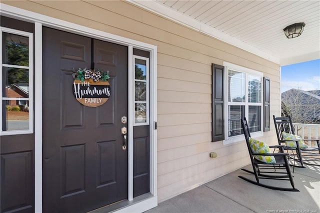 entrance to property with covered porch