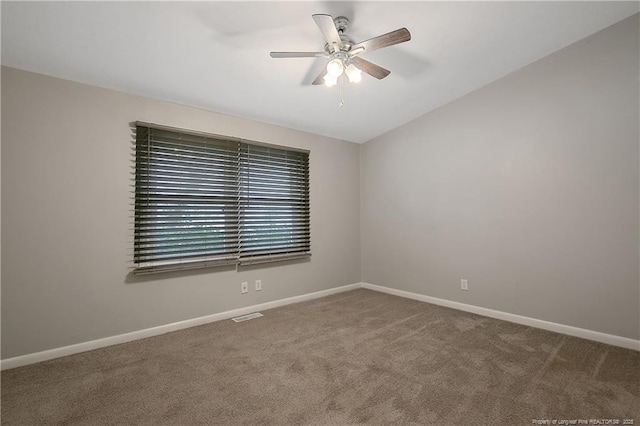 4442 Wellington Dr, Fayetteville, NC 28314 - carpeted empty room with ceiling fan, lofted ceiling, visible vents, and baseboards