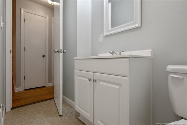 4442 Wellington Dr, Fayetteville, NC 28314 - half bath featuring toilet, baseboards, and vanity