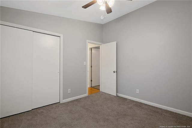 4442 Wellington Dr, Fayetteville, NC 28314 - unfurnished bedroom featuring light carpet, ceiling fan, baseboards, and a closet