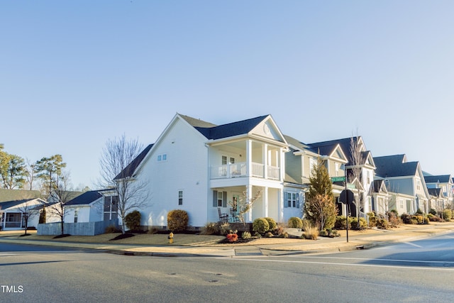 view of front of property with a balcony