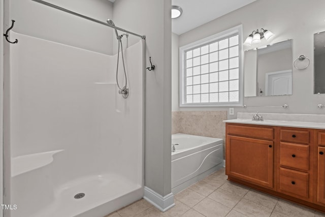 bathroom featuring tile patterned flooring, vanity, and independent shower and bath