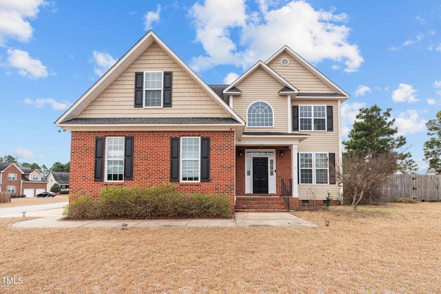 view of front of home featuring a front yard