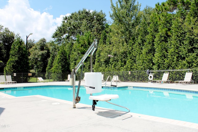 community pool with fence