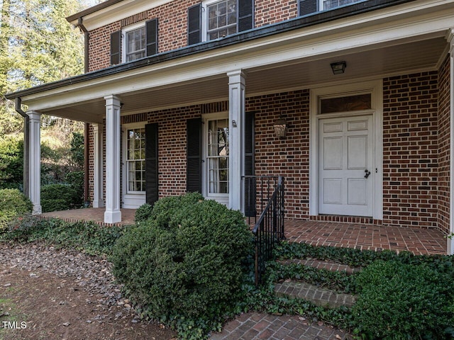 entrance to property with a porch