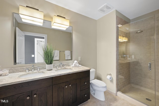 bathroom with walk in shower, tile patterned floors, toilet, and vanity