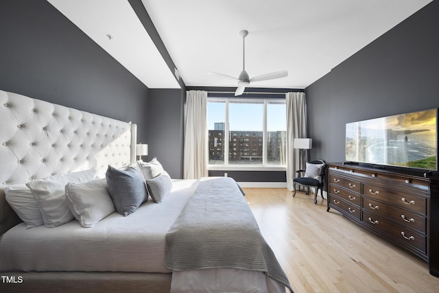 bedroom featuring ceiling fan and light hardwood / wood-style floors