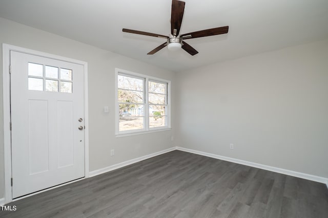 entryway featuring dark wood-type flooring and ceiling fan