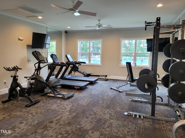 exercise room with ornamental molding