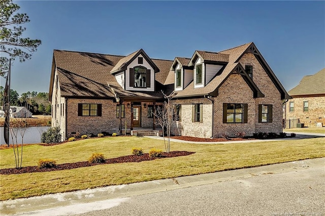 view of front of home with a front yard