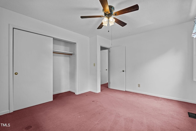 unfurnished bedroom with ceiling fan, carpet floors, and a closet