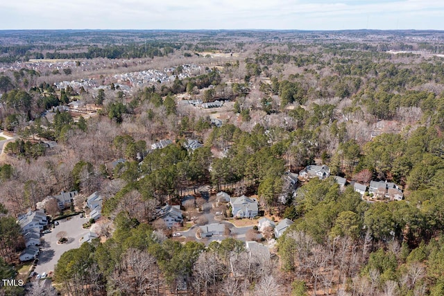 bird's eye view featuring a forest view