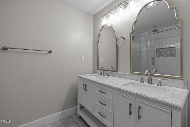 bathroom with vanity and a shower with shower door