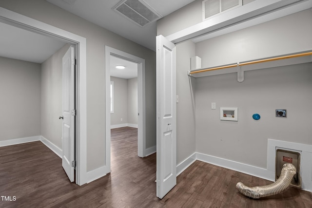 laundry room with hookup for a washing machine, electric dryer hookup, and dark hardwood / wood-style flooring