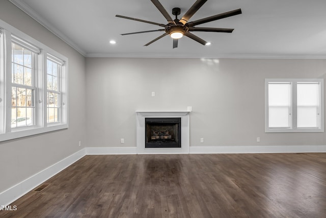 unfurnished living room with ornamental molding, ceiling fan, and dark hardwood / wood-style flooring