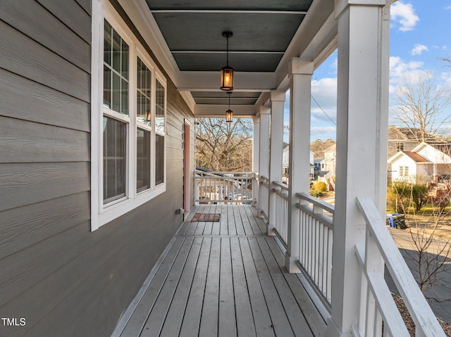 wooden terrace with covered porch