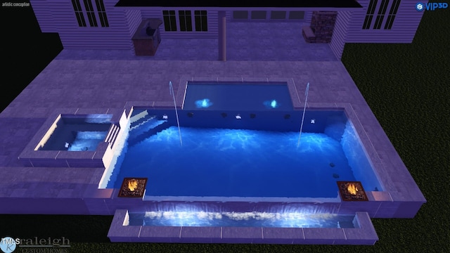 view of pool with an in ground hot tub