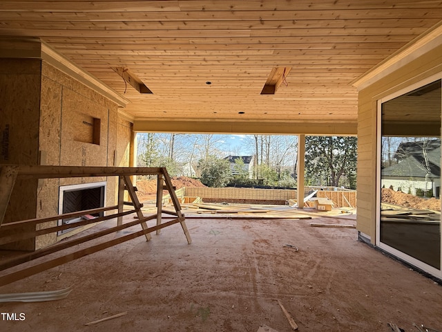 exterior space featuring wood ceiling and a healthy amount of sunlight