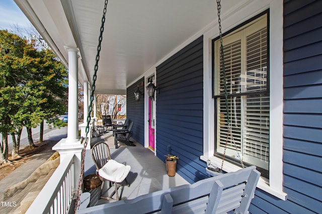 wooden deck with a porch