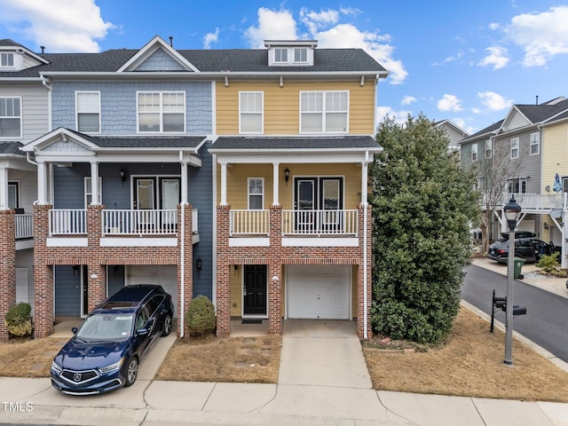 townhome / multi-family property featuring a garage