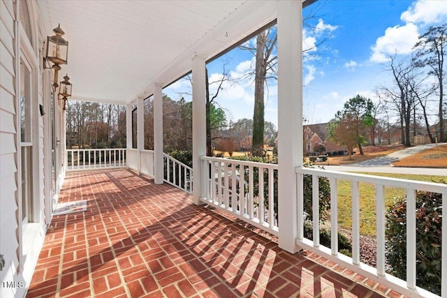 balcony featuring a porch