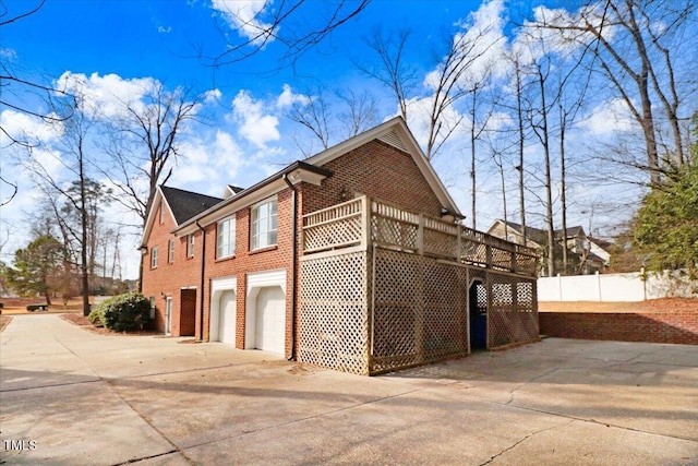 view of property exterior featuring a garage