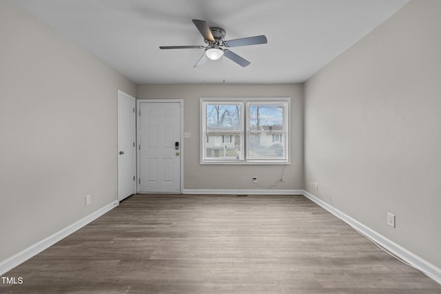 unfurnished room featuring wood-type flooring and ceiling fan