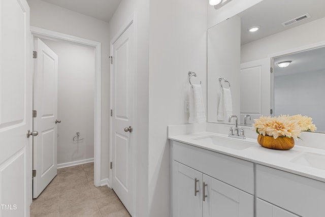 bathroom with recessed lighting, visible vents, vanity, and tile patterned flooring